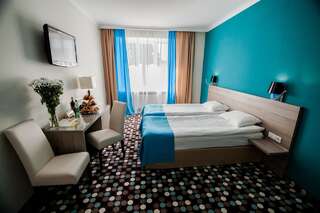 Отель Optima Rivne Ровно Улучшенный двухместный номер с 2 отдельными кроватями-1